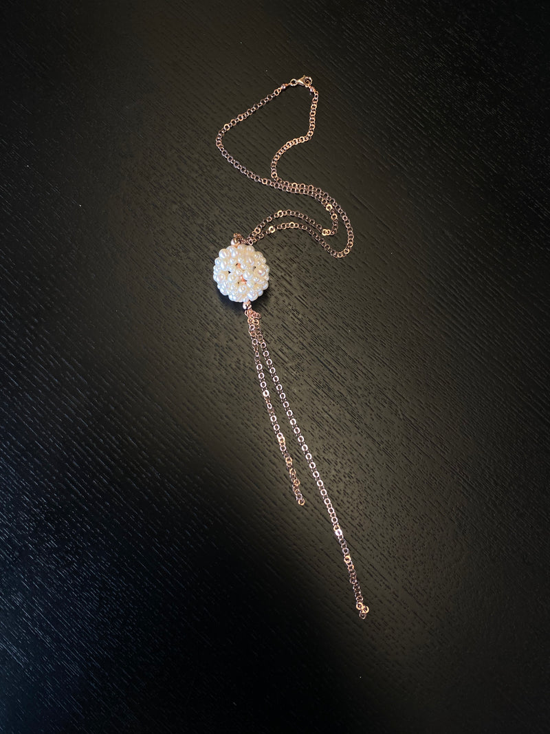 Hydrangea Pearl Rose Gold Pendant on table